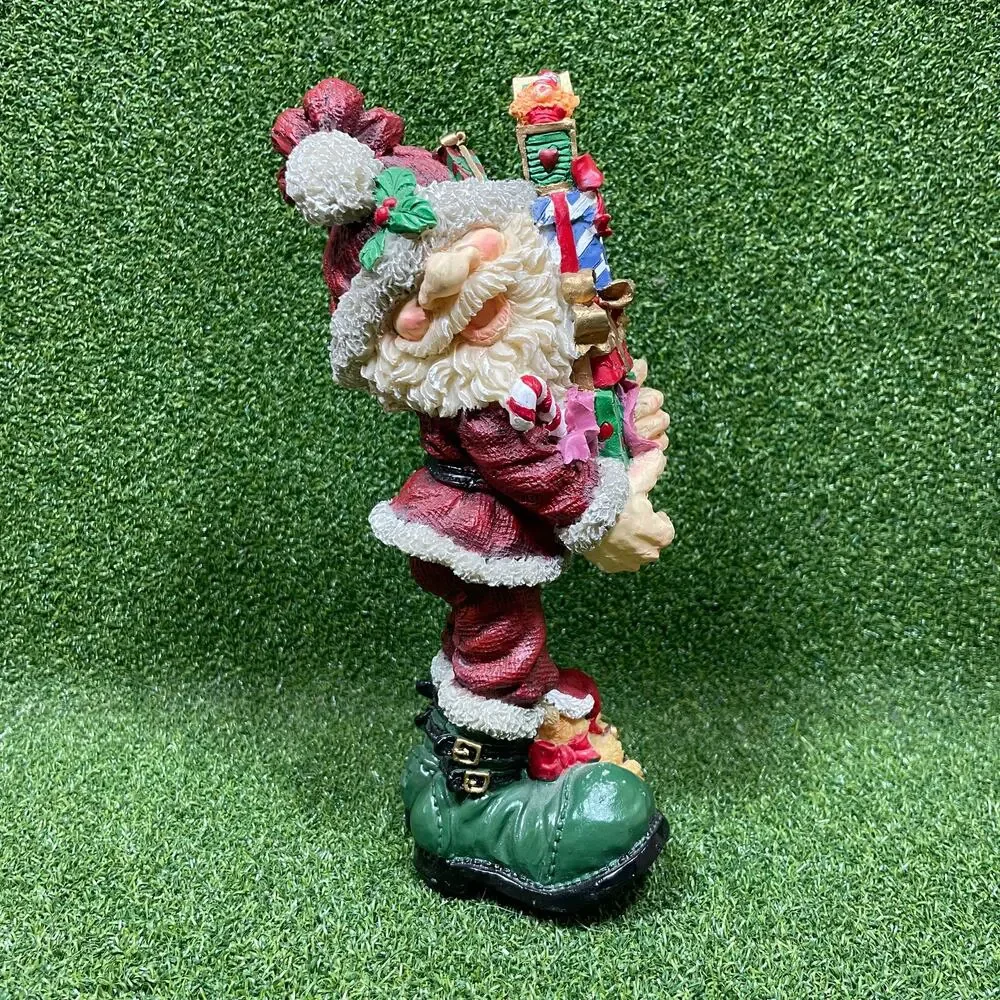 Resin Santa Holding Christmas Presents Figurine 9